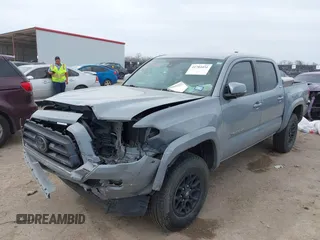 2021 Toyota Tacoma 4WD SR with VIN 5TFCZ5AN3MX260853, listed as a IAAI auction lot 41784451 with 122,244 mi miles. Bid and sale history available at carsss.com. Image 17.