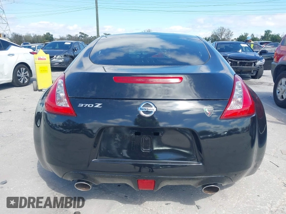 2017 Nissan 370Z with VIN JN1AZ4EH5HM954458, listed as a IAAI auction lot 41629907 with 113,606 mi miles. Bid and sale history available at carsss.com. Image 15.