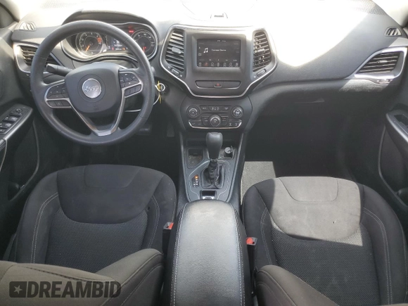 2019 Jeep Cherokee Latitude с VIN 1C4PJLCB9KD313506, выставлен на аукционе Copart как лот 52672515 с пробегом 136 496 миль миль и Списание • Salvage title. История ставок и продаж доступна на DreamBid. Изображение 8.