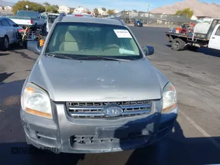2005 Kia Sportage LX with VIN KNDJE723957066325, listed as a IAAI auction lot 41408266 with 225,570 mi miles and . Bid and sale history available at carsss.com. Image 6.
