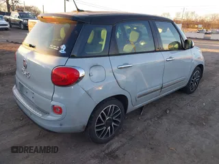 2015 FIAT 500L Lounge with VIN ZFBCFACH8FZ031314, listed as a IAAI auction lot 41392026 with 184,145 mi miles. Bid and sale history available at carsss.com. Image 4.