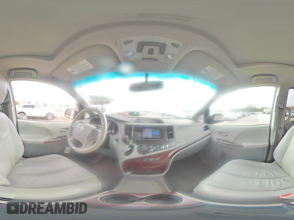 2012 Toyota Sienna XLE AAS with VIN 5TDYK3DC0CS250830, listed as a Copart auction lot 73323284 with 147,580 mi miles and Salvage Title. Bid and sale history available at DreamBid. Image 14.