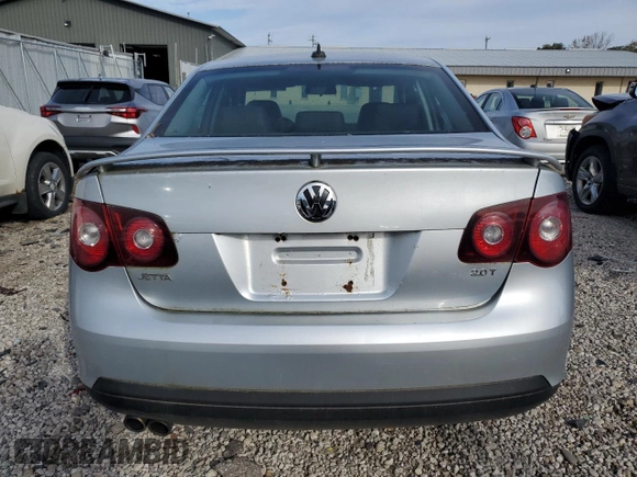 2008 Volkswagen Jetta Wolfsburg Edition z VIN 3VWRJ71K98M189900, wystawiony jako Copart lot #77866404 z przebiegiem 143 209 mil mil oraz Czysty tytuł • Clean title. Historia ofert i sprzedaży dostępna na DreamBid. Obrazek 6.