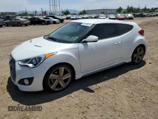 2013 Hyundai Veloster Turbo with VIN KMHTC6AE2DU162790, listed as a Copart auction lot 66404685 with 128,120 mi miles and Clean title. Bid and sale history available at DreamBid. Image 1.