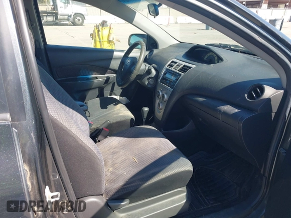 2007 Toyota Yaris with VIN JTDBT923371105048, listed as a IAAI auction lot 41759923 with 166,458 mi miles. Bid and sale history available at carsss.com. Image 5.