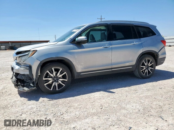2019 Honda Pilot Elite with VIN 5FNYF6H09KB057259, listed as a Copart auction lot 56770835 with 74,492 mi miles and Salvage title. Bid and sale history available at DreamBid. Image 1.