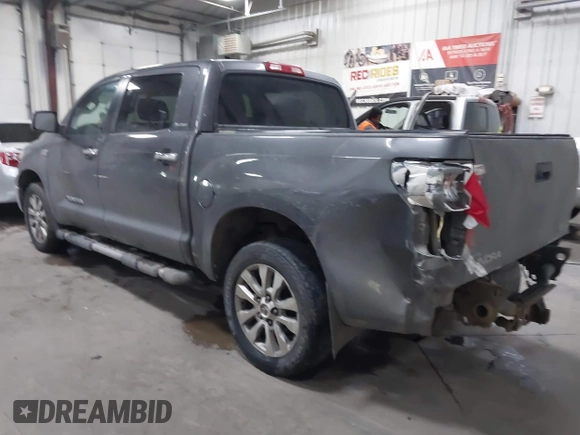2012 Toyota Tundra 4WD Truck LTD with VIN 5TFHW5F14CX267765, listed as a IAAI auction lot 41345269 with 221,400 mi miles. Bid and sale history available at carsss.com. Image 3.