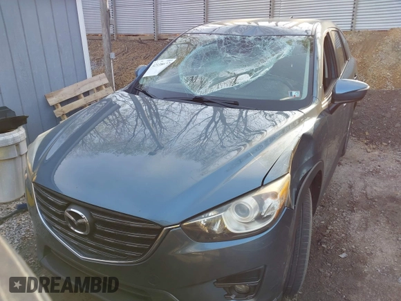 2016 Mazda CX-5 Touring with VIN JM3KE4CY5G0771252, listed as a IAAI auction lot 42138637 with 106,767 mi miles and . Bid and sale history available at carsss.com. Image 12.
