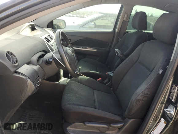 2009 Toyota Yaris with VIN JTDBT903591336734, listed as a Copart auction lot 47306025 with 160,053 mi miles and Salvage Title. Bid and sale history available at carsss.com. Image 7.