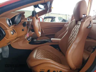 2013 Ferrari California z VIN ZFF65TJA0D0194573, wystawiony jako Copart lot #72021374 z przebiegiem 67 191 mil mil oraz Szkody całkowita. Historia ofert i sprzedaży dostępna na DreamBid. Obrazek 7.