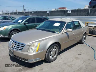 2006 Cadillac DTS w/1SC with VIN 1G6KD57Y26U112518, listed as a IAAI auction lot 42100747 with 122,149 mi miles. Bid and sale history available at carsss.com. Image 2.