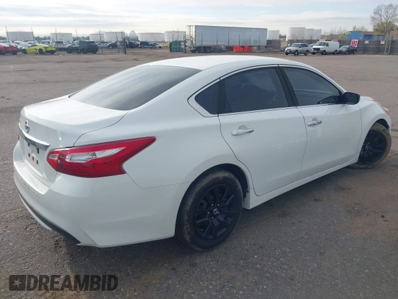 2016 Nissan Altima S with VIN 1N4AL3AP3GC165497, listed as a IAAI auction lot 41960400 with 187,820 mi miles and . Bid and sale history available at DreamBid. Image 4.
