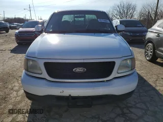 2000 Ford F-150 XL with VIN 1FTRX17L8YNB40935, listed as a Copart auction lot 86726884 with 260,636 mi miles and Salvage Title. Bid and sale history available at carsss.com. Image 5.