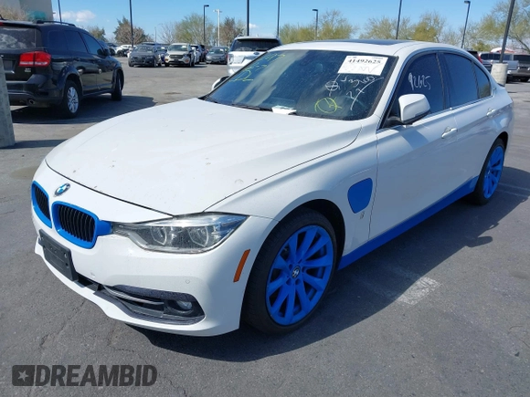 2017 BMW 3 Series 330e iPerformance with VIN WBA8E1C51HK895223, listed as a IAAI auction lot 41492625 with 116,486 mi miles. Bid and sale history available at carsss.com. Image 2.