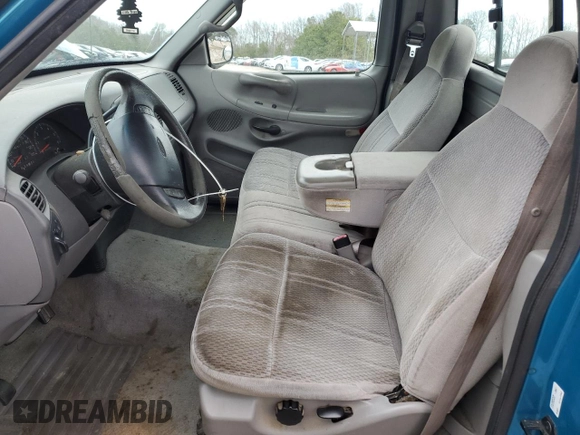 1998 Ford F-150 z VIN 1FTDF17W2WNA09312, wystawiony jako Copart lot #48290845 z przebiegiem 167 417 mil mil oraz Szkoda całkowita • Salvage title. Historia ofert i sprzedaży dostępna na DreamBid. Obrazek 7.