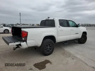 2022 Toyota Tacoma SR5 with VIN 3TMAZ5CN0NM169311, listed as a Copart auction lot 45655195 with 66,113 mi miles and Salvage title. Bid and sale history available at DreamBid. Image 3.