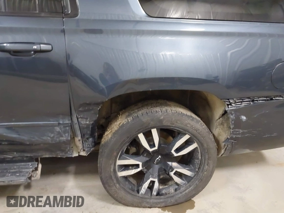 2019 Chevrolet Suburban Premier with VIN 1GNSKJKJ8KR169252, listed as a IAAI auction lot 41472231 with 95,266 mi miles and . Bid and sale history available at DreamBid. Image 6.