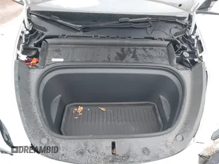 2021 Tesla Model Y Performance with VIN 5YJYGDEF6MF261711, listed as a IAAI auction lot 41176208 with 25,687 mi miles and . Bid and sale history available at DreamBid. Image 10.