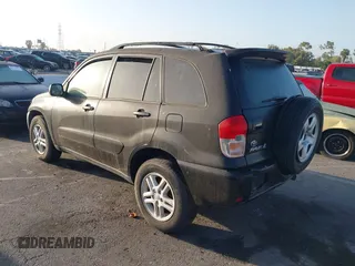 2003 Toyota RAV4 with VIN JTEGH20V730103625, listed as a IAAI auction lot 42305143 with 267,717 mi miles and . Bid and sale history available at DreamBid. Image 3.