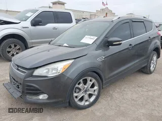 2016 Ford Escape Titanium with VIN 1FMCU0J9XGUC58149, listed as a IAAI auction lot 41739005 with 111,594 mi miles. Bid and sale history available at carsss.com. Image 2.