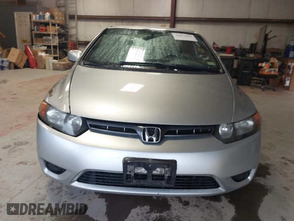 2006 Honda Civic Cpe LX with VIN 2HGFG126X6H532696, listed as a IAAI auction lot 42016264 with 209,509 mi miles. Bid and sale history available at carsss.com. Image 13.