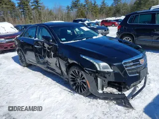 2016 Cadillac CTS Luxury Collection AWD with VIN 1G6AX5SS6G0121804, listed as a IAAI auction lot 41620531 with 98,764 mi miles and . Bid and sale history available at DreamBid. Image 1.