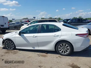 2019 Toyota Camry LE with VIN 4T1B11HK4KU180995, listed as a IAAI auction lot 42088737 with 133,813 mi miles and . Bid and sale history available at DreamBid. Image 15.