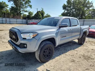 2020 Toyota Tacoma SR5 z VIN 3TMAZ5CN7LM122919, wystawiony jako Copart lot #65643005 z przebiegiem 69 096 mil mil oraz Szkoda całkowita • Salvage title. Historia ofert i sprzedaży dostępna na DreamBid. Obrazek 1.