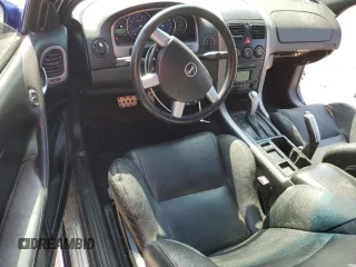 2004 Pontiac GTO with VIN 6G2VX12GX4L287389, listed as a Copart auction lot 57881874 with 107,291 mi miles and Salvage Title. Bid and sale history available at carsss.com. Image 8.