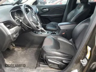 2015 Jeep Cherokee Trailhawk with VIN 1C4PJMBSXFW545534, listed as a Copart auction lot 62236885 with 148,448 mi miles and Clean title. Bid and sale history available at DreamBid. Image 7.