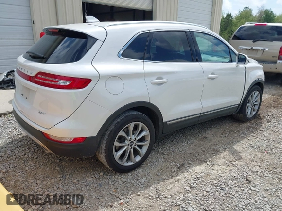 2018 Lincoln MKC Select with VIN 5LMCJ2C96JUL32351, listed as a IAAI auction lot 41964998 with 102,680 mi miles and . Bid and sale history available at DreamBid. Image 4.