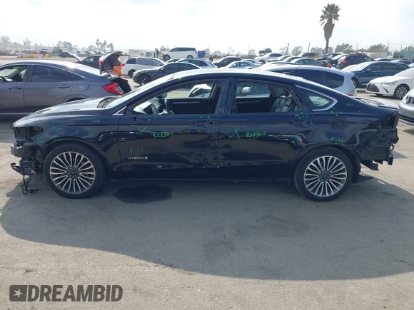2018 Ford Fusion Titanium with VIN 3FA6P0RU6JR115236, listed as a IAAI auction lot 42111343 with 106,858 mi miles and . Bid and sale history available at DreamBid. Image 15.