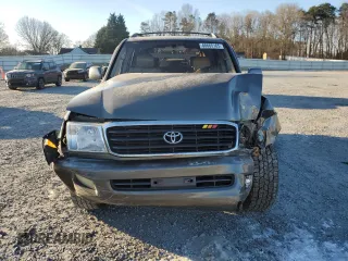 1999 Toyota Land Cruiser with VIN JT3HT05J9X0074477, listed as a Copart auction lot 88665165 with 196,783 mi miles and Salvage Title. Bid and sale history available at carsss.com. Image 5.