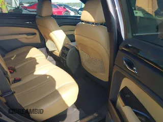 2014 Cadillac SRX Performance Collection with VIN 3GYFNCE39ES613051, listed as a IAAI auction lot 42113063 with 82,952 mi miles and . Bid and sale history available at carsss.com. Image 8.