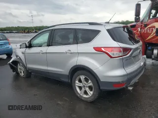 2016 Ford Escape SE z VIN 1FMCU9G93GUC68226, wystawiony jako Copart lot #56764355 z przebiegiem Nie podano mil oraz Szkoda całkowita • Salvage title. Historia ofert i sprzedaży dostępna na DreamBid. Obrazek 2.