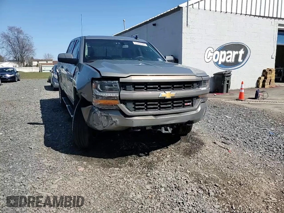 2017 Chevrolet Silverado 1500 LT with VIN 3GCUKREC0HG335785, listed as a Copart auction lot 51456305 with 104,614 mi miles and Salvage Title. Bid and sale history available at DreamBid. Image 13.
