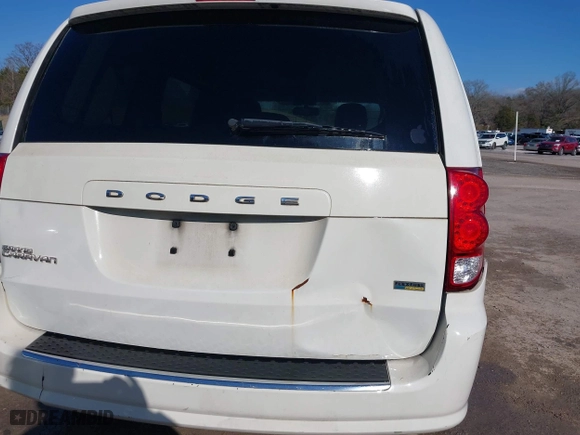 2012 Dodge Grand Caravan SE with VIN 2C4RDGBG1CR214990, listed as a IAAI auction lot 41737352 with 273,821 mi miles. Bid and sale history available at carsss.com. Image 6.