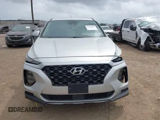 2019 Hyundai Santa Fe SE z VIN 5NMS23AD4KH046066, wystawiony jako IAAI lot #41880900 z przebiegiem 45 220 mil mil oraz . Historia ofert i sprzedaży dostępna na DreamBid. Obrazek 13.