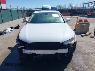 2014 Audi A6 Premium Plus с VIN WAUFGAFCXEN064258, выставлен на аукционе IAAI как лот 41822031 с пробегом 100 714 миль миль и . История ставок и продаж доступна на DreamBid. Изображение 13.