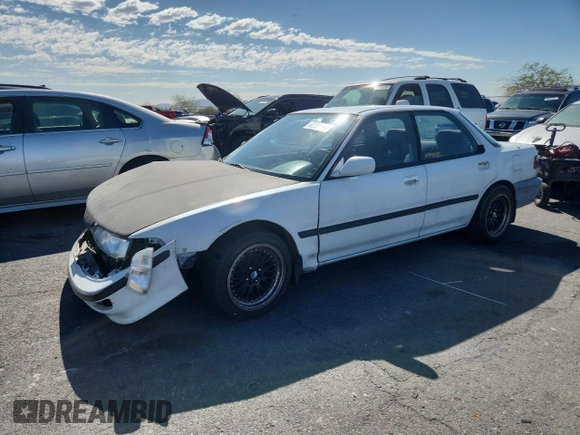 1992 Acura Integra with VIN JH4DB1649NS000455, listed as a Copart auction lot 62386755 with 209,785 mi miles and Salvage title. Bid and sale history available at DreamBid. Image 1.