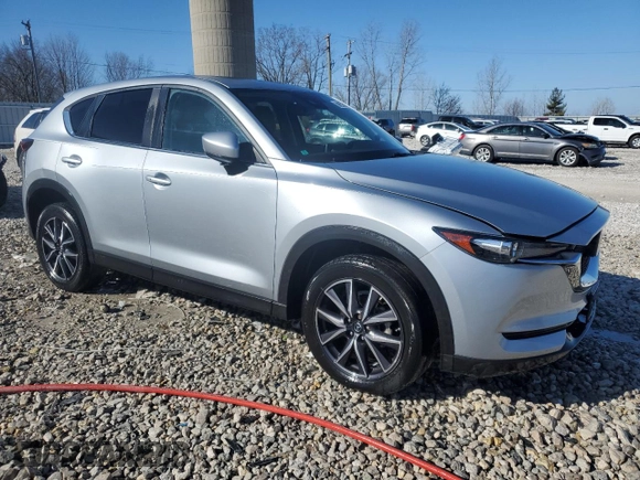 2018 Mazda CX-5 Touring with VIN JM3KFBCM3J0409166, listed as a Copart auction lot 50629695 with Not Provided miles and Clean Title. Bid and sale history available at carsss.com. Image 4.