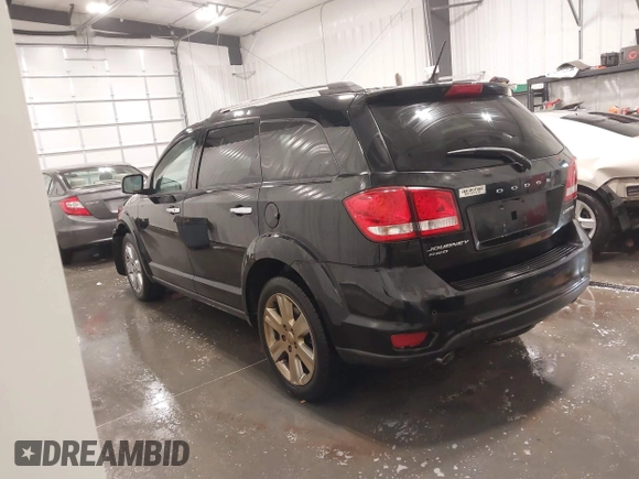 2014 Dodge Journey Limited with VIN 3C4PDDDG7ET154300, listed as a IAAI auction lot 41640132 with 175,276 mi miles and . Bid and sale history available at DreamBid. Image 3.