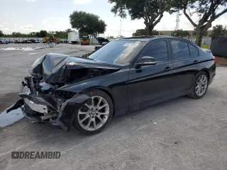 2014 BMW 3 Series 320i with VIN WBA3B1C50EF078476, listed as a Copart auction lot 58016085 with 213,752 mi miles and Salvage title. Bid and sale history available at DreamBid. Image 1.