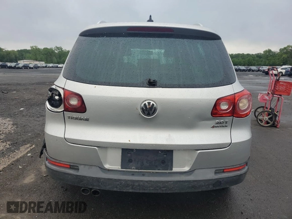 2011 Volkswagen Tiguan SE with VIN WVGBV7AXXBW538750, listed as a Copart auction lot 56604715 with 86,895 mi miles and Salvage title. Bid and sale history available at DreamBid. Image 6.