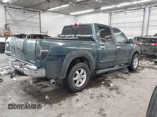 2004 Nissan Titan LE with VIN 1N6AA07B14N511618, listed as a IAAI auction lot 41336419 with 195,863 mi miles and . Bid and sale history available at carsss.com. Image 4.