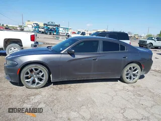 2015 Dodge Charger SXT with VIN 2C3CDXHG9FH825135, listed as a IAAI auction lot 42172793 with 169,324 mi miles and . Bid and sale history available at DreamBid. Image 14.
