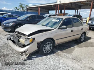 1994 Toyota Corolla Deluxe with VIN JT2AE09B2R0061821, listed as a Copart auction lot 61483215 with 124,210 mi miles and Salvage title. Bid and sale history available at DreamBid. Image 1.