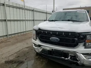 2023 Ford F-150 XL with VIN 1FTEW1EP3PFC53689, listed as a Copart auction lot 51655475 with 17,681 mi miles and Salvage title. Bid and sale history available at DreamBid. Image 13.