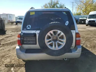 1999 Suzuki Grand Vitara JLX z VIN JS3TD62V0X4113058, wystawiony jako Copart lot #80089884 z przebiegiem 165 794 mil mil oraz Szkoda całkowita • Salvage title. Historia ofert i sprzedaży dostępna na DreamBid. Obrazek 6.