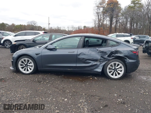 2022 Tesla Model 3 with VIN 5YJ3E1EA6NF143839, listed as a IAAI auction lot 40905007 with 83,897 mi miles and . Bid and sale history available at DreamBid. Image 13.